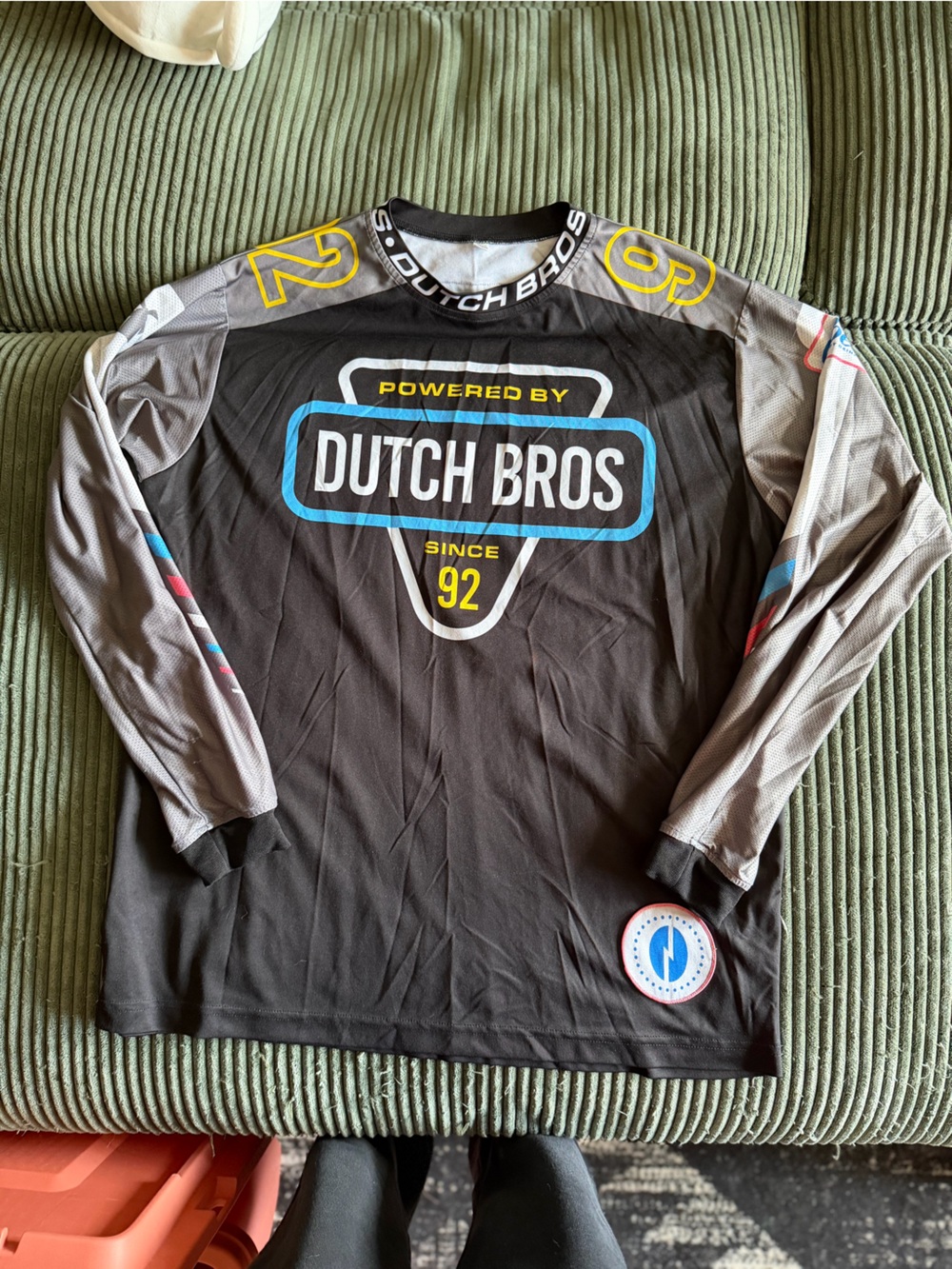 Dutch Bros Black Long-Sleeve Jersey with Gray Sleeves and Blue Accent